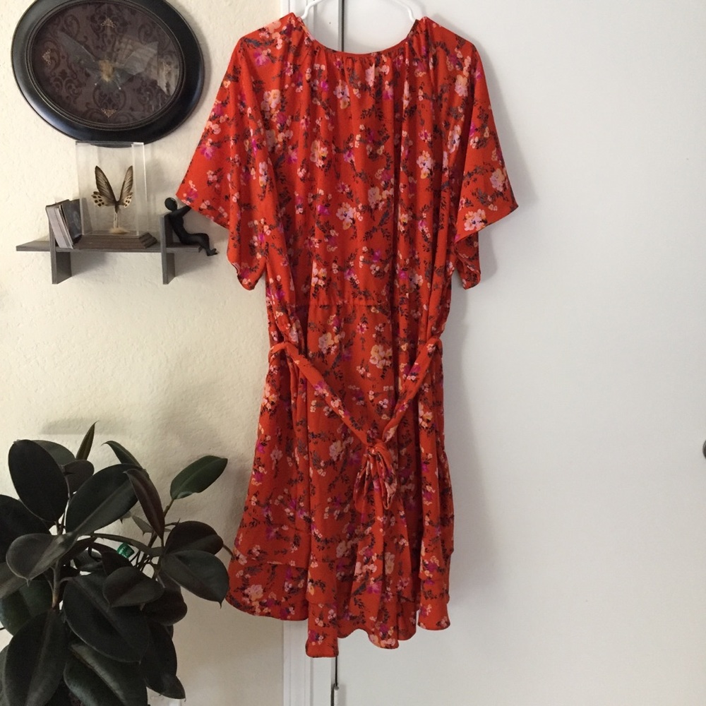Orange floral high-low dress.